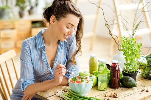 Girl eats salad